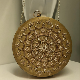 The Golden Aura Clutch Bag