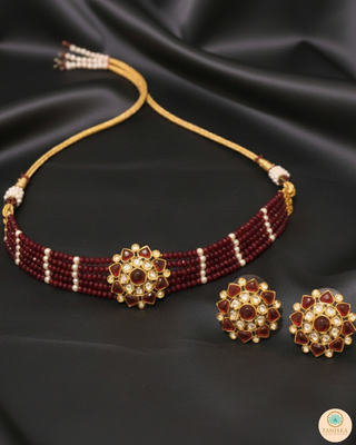 Luxury maroon beaded Kundan choker necklace set with matching earrings, elegant statement jewelry for South Asian bridal weddings and receptions.