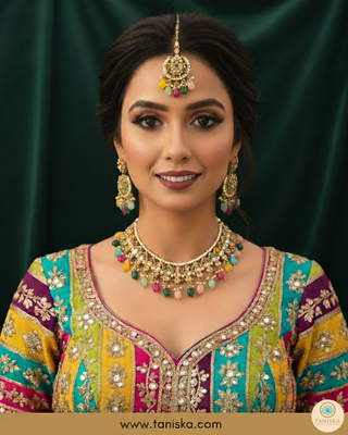 Luxury multicolor beaded Kundan bridal necklace set with matching earrings and maang tikka, vibrant statement jewelry for South Asian weddings and festive celebrations.