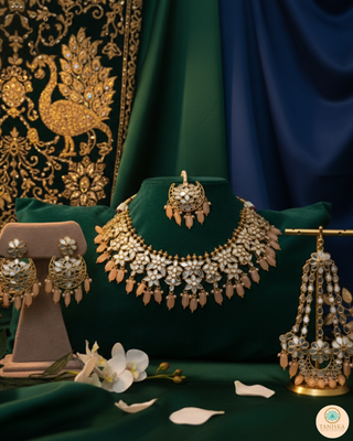 Luxury peach glass work Kundan bridal necklace set with matching earrings and headpiece, statement jewelry for South Asian weddings and nikah ceremonies.