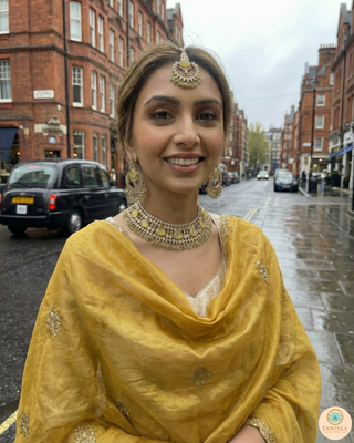 Luxury yellow Kundan bridal necklace set with matching earrings and maang tikka, elegant statement jewelry for South Asian weddings and nikah ceremonies.