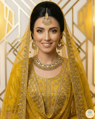 Luxury yellow Kundan bridal necklace set with matching earrings and maang tikka, elegant statement jewelry for South Asian weddings and nikah ceremonies.