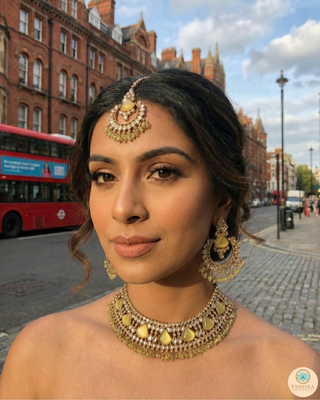 Luxury yellow Kundan bridal necklace set with matching earrings and maang tikka, elegant statement jewelry for South Asian weddings and nikah ceremonies.