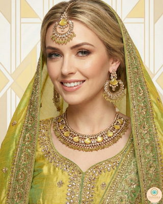 Luxury yellow Kundan bridal necklace set with matching earrings and maang tikka, elegant statement jewelry for South Asian weddings and nikah ceremonies.