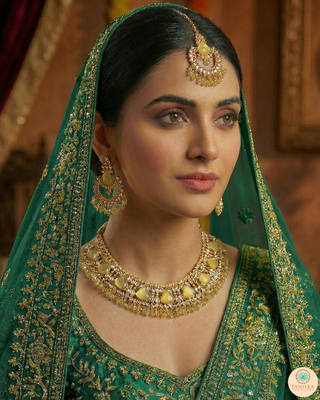 Luxury yellow Kundan bridal necklace set with matching earrings and maang tikka, elegant statement jewelry for South Asian weddings and nikah ceremonies.