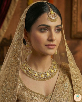 Luxury yellow Kundan bridal necklace set with matching earrings and maang tikka, elegant statement jewelry for South Asian weddings and nikah ceremonies.
