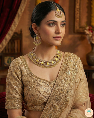 Luxury yellow Kundan bridal necklace set with matching earrings and maang tikka, elegant statement jewelry for South Asian weddings and nikah ceremonies.