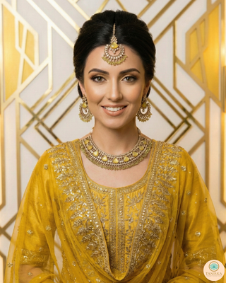Luxury yellow Kundan bridal necklace set with matching earrings and maang tikka, elegant statement jewelry for South Asian weddings and nikah ceremonies.