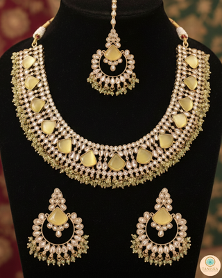 Luxury yellow Kundan bridal necklace set with matching earrings and maang tikka, elegant statement jewelry for South Asian weddings and nikah ceremonies.