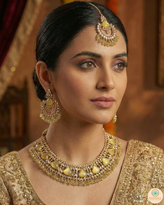 Luxury yellow Kundan bridal necklace set with matching earrings and maang tikka, elegant statement jewelry for South Asian weddings and nikah ceremonies.