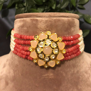 Luxury coral and peach beaded Kundan choker necklace set with matching earrings, elegant statement jewelry for South Asian bridal weddings and receptions.