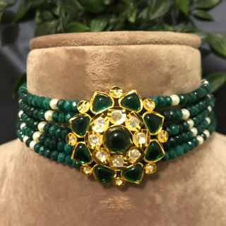 Luxury green emerald beaded Kundan choker necklace set with matching earrings, elegant statement jewelry for South Asian bridal weddings and receptions.