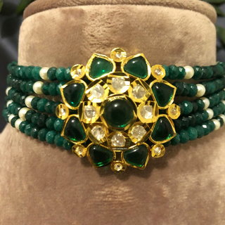 Luxury green emerald beaded Kundan choker necklace set with matching earrings, elegant statement jewelry for South Asian bridal weddings and receptions.