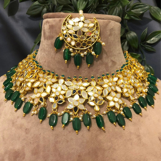 Luxury green glass work Kundan bridal necklace set with matching earrings and headpiece, statement jewelry for South Asian weddings and nikah ceremonies.