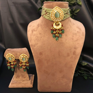 Luxury green beaded Kundan choker necklace set with matching earrings, perfect for South Asian bridal weddings and receptions.