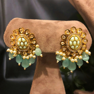 Luxury mint green beaded Kundan choker necklace set with matching earrings, elegant statement jewelry for South Asian bridal weddings and receptions.