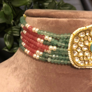 Luxury multicolor beaded Kundan choker necklace set featuring mint green and soft pink beads with matching earrings, elegant statement jewelry for South Asian bridal weddings and festive receptions.