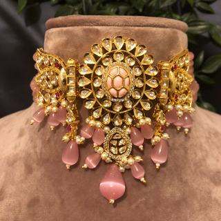 Luxury pink beaded Kundan choker set with matching earrings, an elegant statement piece for South Asian bridal weddings and nikah ceremonies, as seen in www.taniska.com