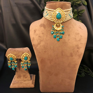 Luxury turquoise blue beaded Kundan choker necklace set with matching earrings, elegant statement jewelry for South Asian bridal weddings and receptions.
