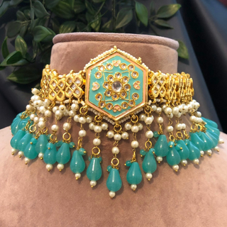 Luxury turquoise meenakari Kundan choker necklace set with matching earrings and maang tikka, vibrant statement jewelry for South Asian bridal weddings and festive occasions
