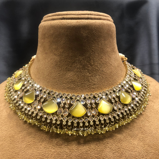Luxury yellow Kundan bridal necklace set with matching earrings and maang tikka, elegant statement jewelry for South Asian weddings and nikah ceremonies.