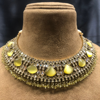 Luxury yellow Kundan bridal necklace set with matching earrings and maang tikka, elegant statement jewelry for South Asian weddings and nikah ceremonies.